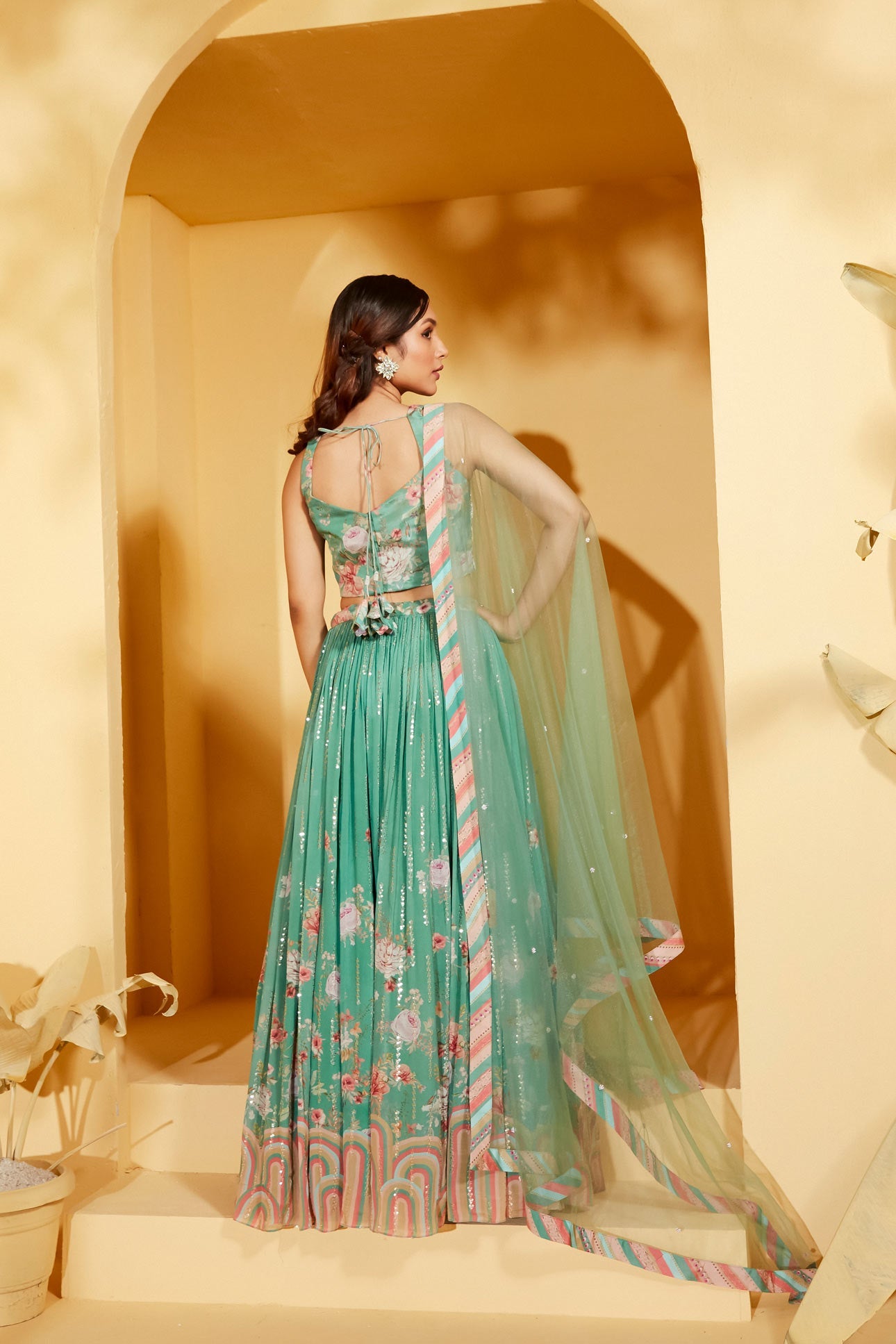 Green Sleeveless Lehenga Set