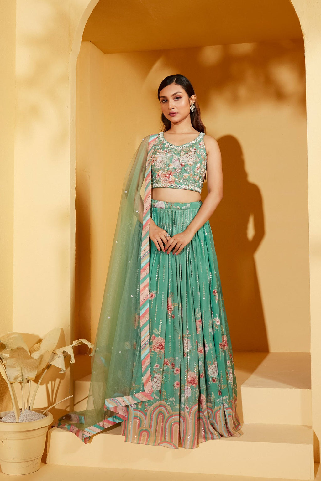 Green Sleeveless Lehenga Set