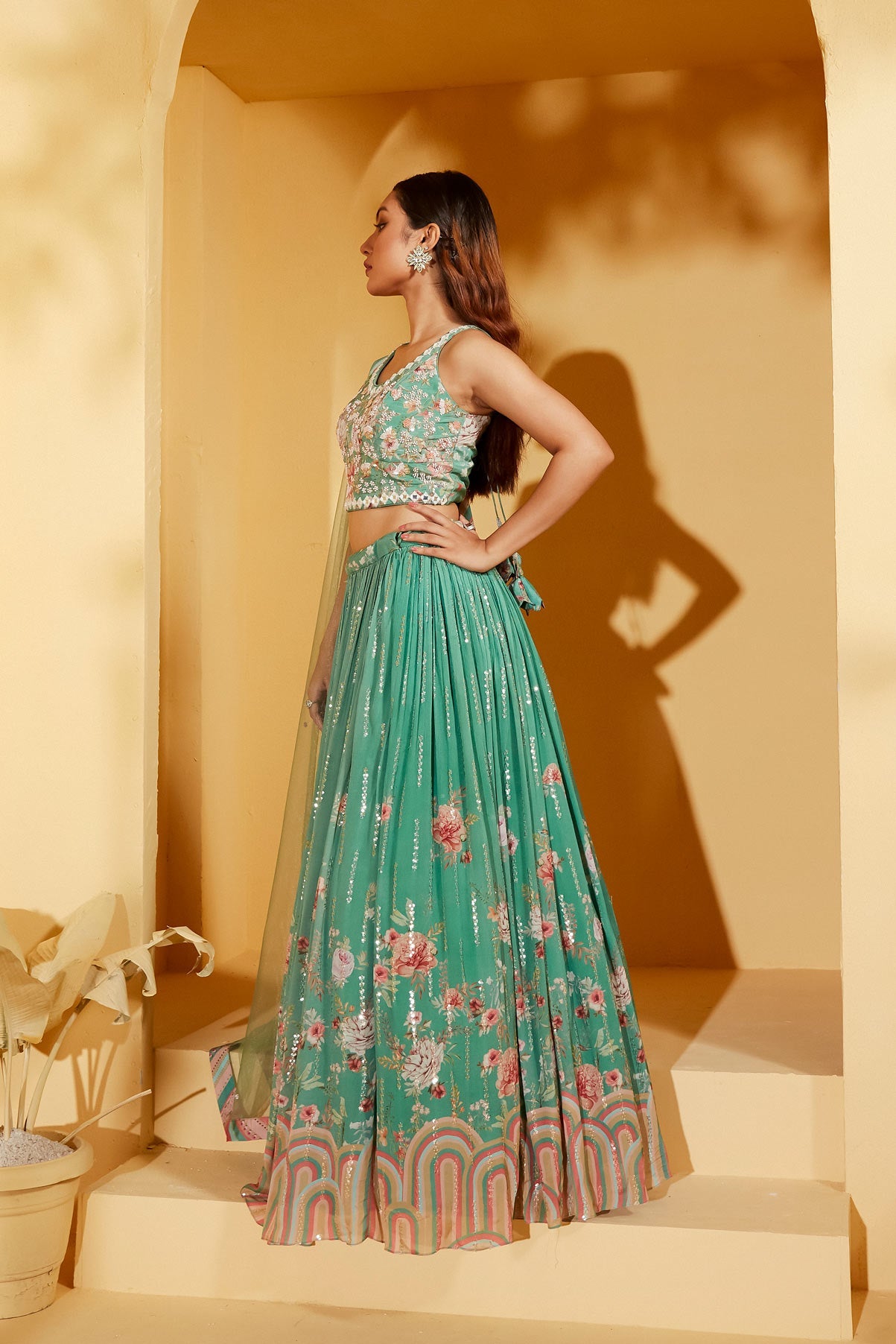 Green Sleeveless Lehenga Set