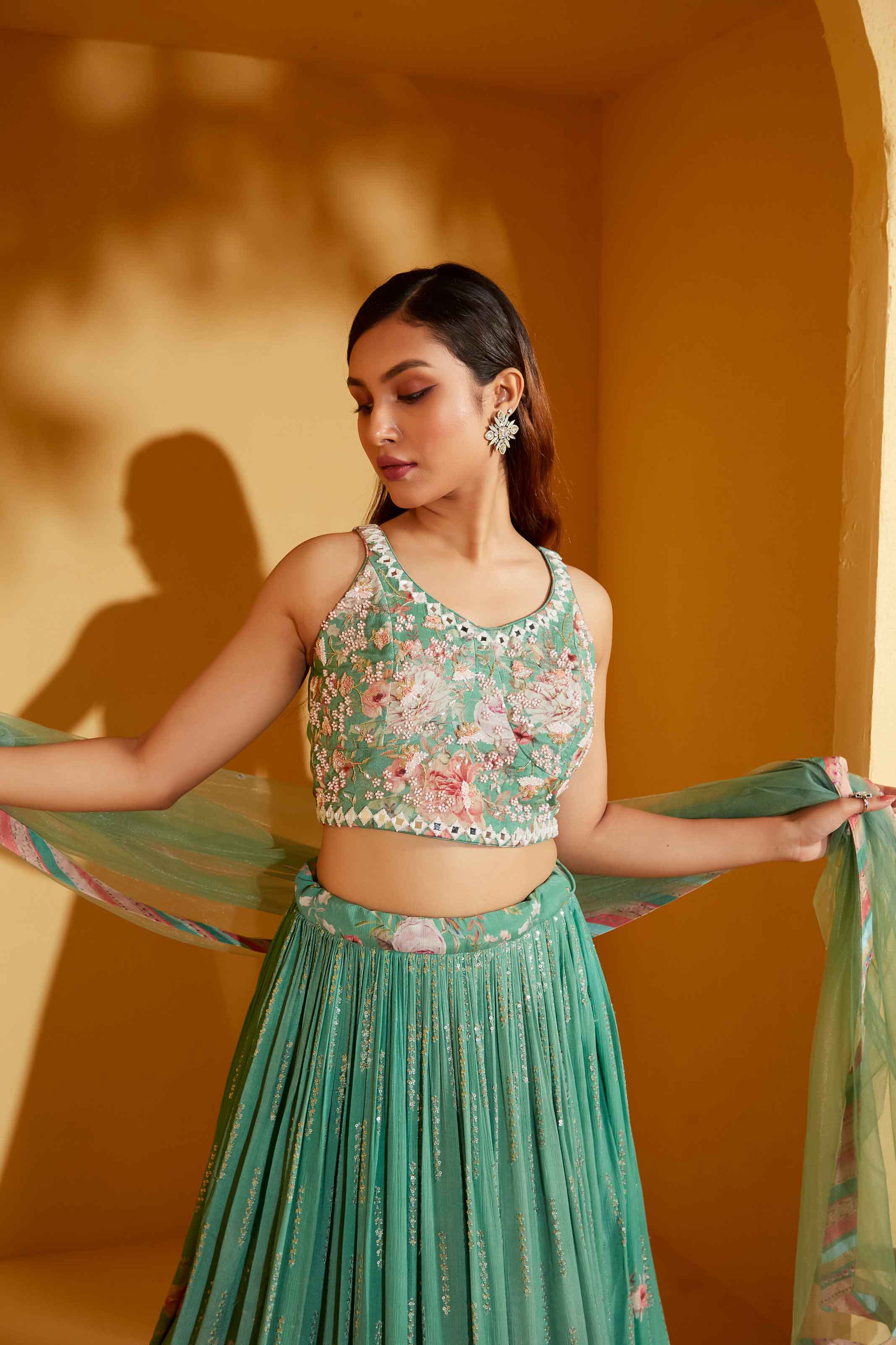 Green Sleeveless Lehenga Set